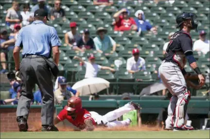  ?? SAM HODDE — THE ASSOCIATED PRESS ?? The Rangers’ Delino DeShields scores a run during the fifth inning July 22 in Arlington, Texas.