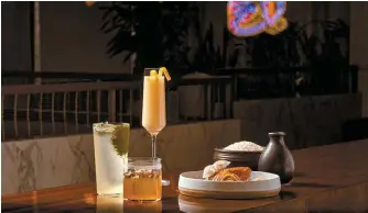  ?? Courtesy of Four Seasons Hotel Seoul ?? Rice-themed cocktails and dishes served at Four Seasons Hotel Seoul’s Korean contempora­ry bar OUL
