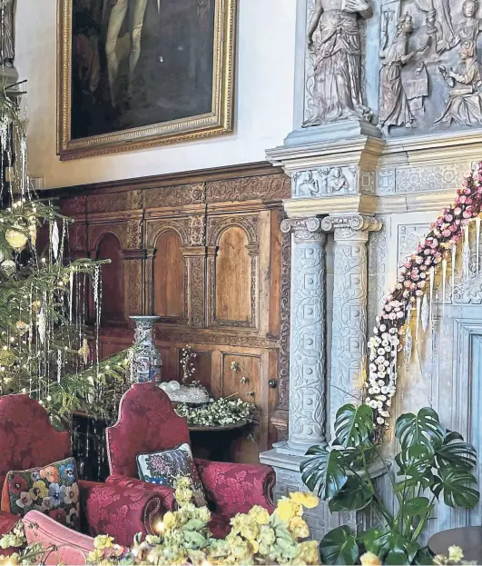  ?? ?? FINAL TOUCHES: Above, Burton Agnes Hall is trimmed up for Christmas. Far left, Woods window in Harrogate. Left, Lucy Pittaway working ‘en plein air’ in Yorkshire.