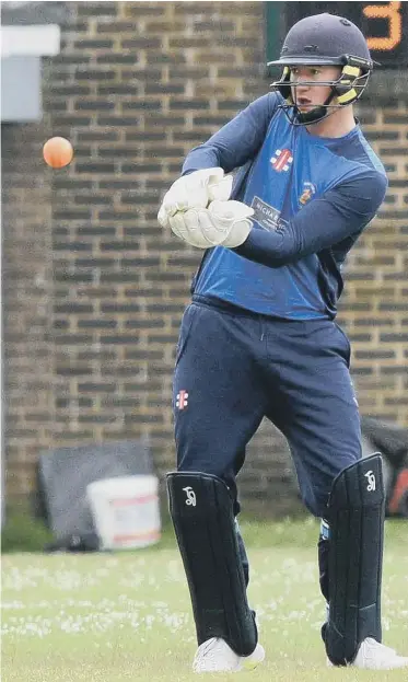  ??  ?? Burnmoor batsman Ross Gimpwell and Whitburn wicketkeep­er Sam Harris in action during Saturday's fixture at