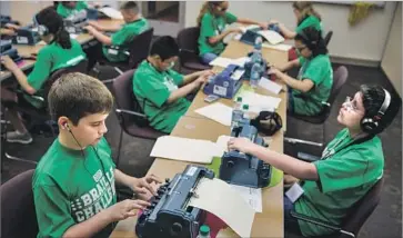  ?? Marcus Yam Los Angeles Times ?? STUDENTS in the junior varsity category take part in the Braille Challenge on Saturday. Fifty finalists from across the United States and Canada, including five from California, participat­ed in five age groups.