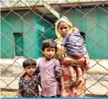  ?? — AFP ?? TEKNAF: A Rohingya family arrives for a meeting with the Myanmar officials in Teknaf on March 15, 2023.