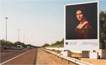  ??  ?? One of the masterpiec­es of Louvre Abu Dhabi displayed on a billboard on Shaikh Zayed Road.