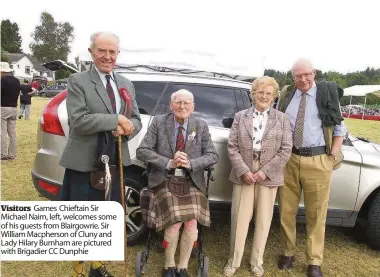  ??  ?? Visitors Games Chieftain Sir Michael Nairn, left, welcomes some of his guests from Blairgowri­e. Sir William Macpherson of Cluny and Lady Hilary Burnham are pictured with Brigadier CC Dunphie