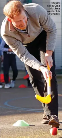  ??  ?? Hockey skills: On a visit to a youth club yesterday