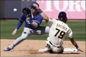  ?? MORRY GASH — THE ASSOCIATED PRESS ?? Los Angeles Dodgers' Gavin Lux tags out Milwaukee Brewers' Sal Frelick at second on a stolen base attempt during the second inning of a spring training game on Saturday in Phoenix.