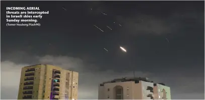  ?? (Tomer Neuberg/Flash90) ?? INCOMING AERIAL threats are intercepte­d in Israeli skies early Sunday morning.
