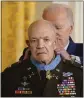  ?? EVAN VUCCI THE ASSOCIATED PRESS ?? President Joe Biden awards the Medal of Honor to retired Army Col. Paris
Davis for his heroism during the Vietnam War at the White House on Friday.