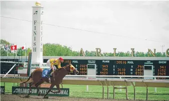  ?? SUN-TIMES FILE ?? Corporate owner Churchill Downs has refused to commit to live racing at Arlington Internatio­nal Racecourse beyond 2021.