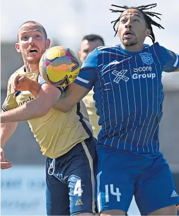  ??  ?? TOP MAN: New Forfar boss Gary Irvine battles Peterhead’s Niah Payne.