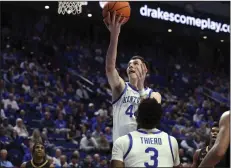  ?? (AP/James Crisp) ?? Zvonimir Ivisic (shooting) averaged 5.5 points and 3.3 rebounds in 15 games for Kentucky last season. On Monday, Ivisic became the first commitment to new University of Arkansas Coach John Calipari.
