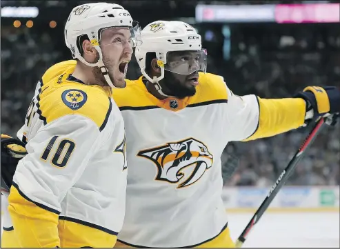  ?? GETTY IMAGES ?? Colton Sissons (left) and P.K. Subban of Nashville celebrate a goal yesterday. The Predators will take on the Jets in Round 2.