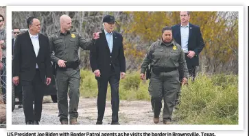  ?? ?? US President Joe Biden with Border Patrol agents as he visits the border in Brownsvill­e, Texas.