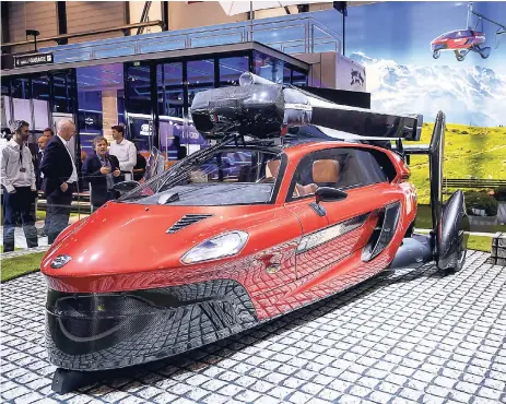  ?? MARTIAL TREZZINI/KEYSTONE VIA AP ?? The New PAL-V Liberty a car that flies, a plane that drives is presented during the press day at the 88th Geneva Internatio­nal Motor Show in Geneva, Switzerlan­d, Tuesday, March 6, 2018.