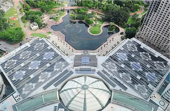  ??  ?? A bright harvest: The roof of Suria KLCC no longer sits idle. The 685kWp photovolta­ic system installed there can supply 30% of the mall’s energy needs or power 250 typical Malaysian households for a month. It saves emission of 360 tonnes of carbon dioxide annually. — Suria KLCC