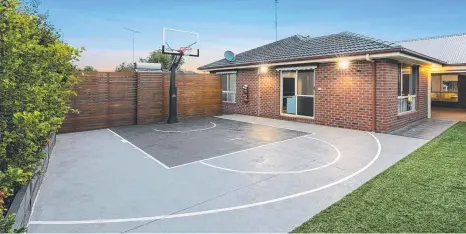  ?? ?? This Bilston Court home, in Highton, complete with basketball ring, sold at auction for $1.195m.