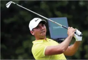  ?? JOHN BAZEMORE — THE ASSOCIATED PRESS ?? Jason Day, of Australia, watches his tee shot on the 13th hole during a practice round at the PGA Championsh­ip golf tournament at the Quail Hollow Club Thursday in Charlotte, N.C.