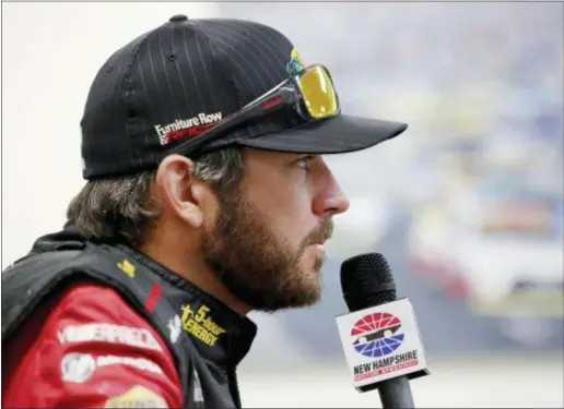  ?? THE ASSOCIATED PRESS ?? NASCAR Cup Series driver Martin Truex Jr. speaks to the media before auto racing practice Friday at New Hampshire Motor Speedway.