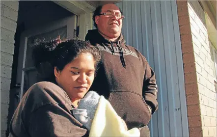  ??  ?? Stuck: Kathleen Waka, left, with 1-week old Zavier and partner Jason Price have suffered from the town’s lack of maternity services.