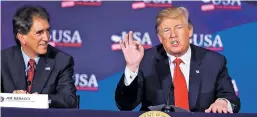  ?? MANUEL BALCE CENETA/ASSOCIATED PRESS ?? President Donald Trump speaks during a roundtable discussion on tax reform at the Cleveland Public Auditorium and Conference Center on Saturday. At right is Rep. Jim Renacci, R-Ohio.