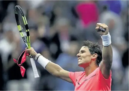  ?? MATTHEW STOCKMAN/GETTY IMAGES ?? Rafael Nadal, of Spain, celebrates defeating Andrey Rublev of Russia after their Men’s Singles quarter-final match on Day 10 of the 2017 U.S. Open.