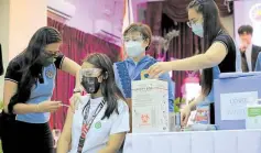  ?? INFORMATIO­N OFFICE —PHOTO COURTESY OF CITY OF SAN FERNANDO ?? GETTING JABBED A medical student in a private school in the City of San Fernando, Pampanga province, is being inoculated against COVID-19 in the vaccinatio­n program for college students on Oct. 13.