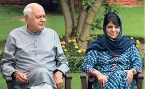  ??  ?? FAROOQ ABDULLAH of the N.C. and Mehbooba Mufti of the PDP, during an all-party meeting in Srinagar on August 4, 2019.