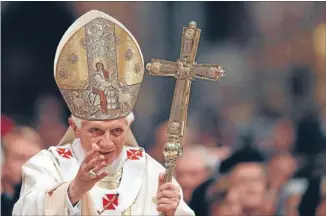  ?? Photo: REUTERS ?? Drained: Pope Benedict XVI waves as he leaves at the end of a vigil mass during the Easter celebratio­ns at St Peter’s Basilica in the Vatican.