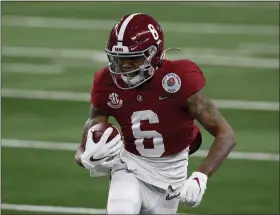 ?? ROGER STEINMAN — THE ASSOCIATED PRESS ?? Alabama wide receiver DeVonta Smith runs after a catch in the first half of the Rose Bowl against Notre Dame in Arlington, Texas, on Jan. 1.