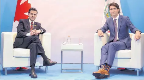  ??  ?? En el encuentro entre el presidente Enrique Peña Nieto y el primer ministro de Canadá, Justin Trudeau, hablaron sobre la apertura política entre ambas naciones.