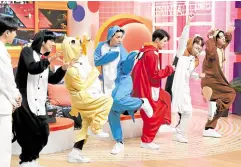  ?? ?? ONF play around with each other as they don their cutest pajamas to meet fans all over the world.