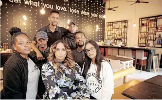  ?? ?? THE MARKET, one of Durban’s favourite venues, is closing because of the effects of load shedding. Saying goodbye are, clockwise from left, Thobeka Mntungwa, Sihle Ngubane, Scelo Ngcobo, Nhlaka Mwelase, Bonginkosi Vundla, daughter Miskha Bedderson and, centre front, owner Avril Bedderson. | SHELLEY KJONSTAD African News Agency (ANA)