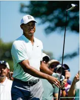  ?? GREGORY SHAMUS / GETTY IMAGES ?? Tiger Woods, who had failed to break par in the opening round at 10 of his past 11 tournament­s, had birdie chances on all but two greens Thursday at the BMW Championsh­ip.