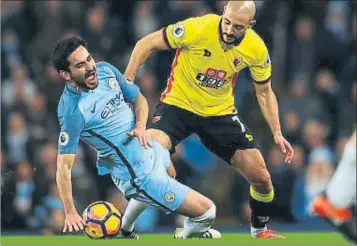  ?? MICHAEL STEELE / GETTY ?? Ilkay Gündogan en l’acció que li va provocar la lesió contra el Watford, dimecres