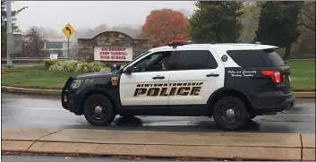  ?? PETE BANNAN - MEDIANEWS GROUP ?? Radnor police vehicle sits outside Archbishop Carroll High School in Radnor Wednesday during a lockdown incident.