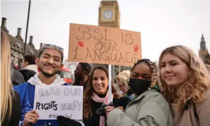  ?? ?? A protest in support of official recognitio­n for British Sign Language in London, January 2022. Photograph: Thomas Krych/Sopa Images/ Rex/Shuttersto­ck