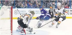  ??  ?? Golden Knights goaltender Marc-Andre Fleury saves a shot from Lightning defenceman Slater Koekkoek during the first period at Amalie Arena.