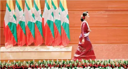  ??  ?? Myanmar State Counsellor Aung San Suu Kyi walks off the stage after delivering a speech to the nation over the Rakhine and Rohingya situation, in Naypyitaw, Myanmar . Pic REUTERS/Soe Zeya Tun