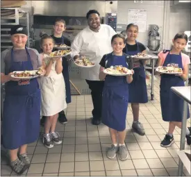  ?? SUBMITTED PHOTO ?? Chef Jarrett Young with Create-a-Cook campers.