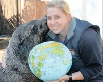  ?? PICTURE: SUPPLIED ?? Hobie the Seal with uShaka Sea World Animal Behaviouri­st Ana Eyre commemorat­e World Oceans Day today, a day dedicated to celebratin­g the world’s oceans, their diversity and the critical role they play in sustaining life on land.