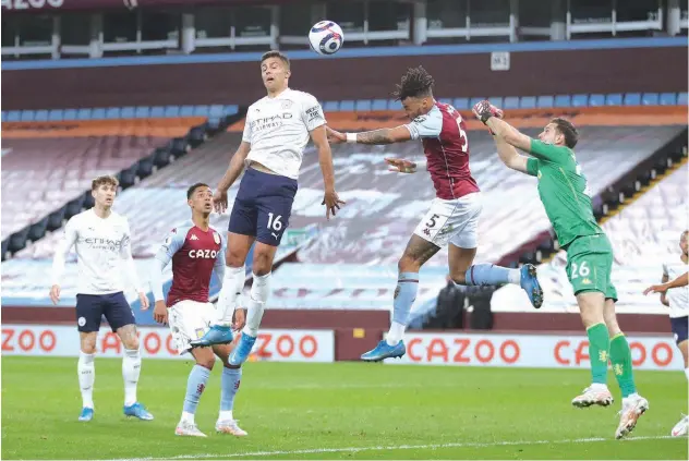  ?? Agence France-presse ?? ↑
Manchester City and Aston Villa players vie for the ball during their EPL match on Wednesday.