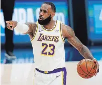  ?? DAVID ZALUBOWSKI THE ASSOCIATED PRESS FILE PHOTO ?? LeBron James, pictured, Giannis Antetokoun­mpo and Kawhi Leonard are among the NBA stars who have expressed their unhappines­s about playing an all-star game during a pandemic.