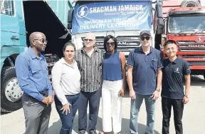  ??  ?? Shacman partners (from left) and Curtis Martin, acting managing director, JN Bank; Karen Lawson, spokespers­on for Conveyance Partners Jamaica (CPJ); Keith Senior, consultant, JN Bank; Naomi Dawkins, managing director, CPJ; Chris Bicknell, Chief Executive Officer, Tank-Weld and Fisher Wang, commercial representa­tive, Shacman.