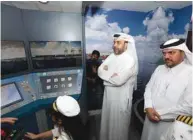  ??  ?? Mwani Qatar chief executive al-Khanji (centre) at the opening of its facility at KidzMondo Doha yesterday.