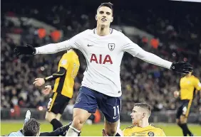  ??  ?? Tottenham’s Erik Lamela celebrates after scoring his side’s second goal during their English FA Cup fourth-round replay against Newport County at Wembley Stadium in London yesterday.