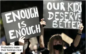  ??  ?? Protesters make their feelings clear