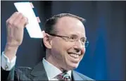  ?? MICHAEL REYNOLDS/EPA ?? Deputy Attorney General Rod Rosenstein presents a copy of the Constituti­on during a Tuesday event at Newseum.