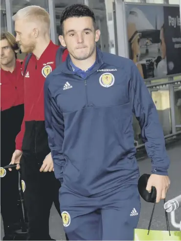  ??  ?? 0 John Mcginn and the Scotland squad’s flight into Tel Aviv was delayed by an hour last night.