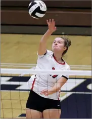  ?? PILOT PHOTO/RUDY MARQUEZ ?? Miranda German gets a kill during sectional play for the Plymouth Lady Pilgrims. The PHS senior signed to continued her academic and athletic career at Cornerston­e University in Michigan.