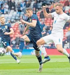  ??  ?? Ryan Christie tussles with Tomas Kalas of the Czech Republic during Scotland’s Euro 2020 opener